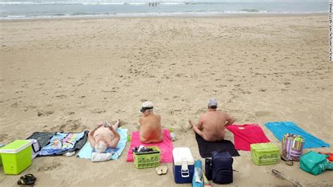At nudist beach. . Playas nudistas porn